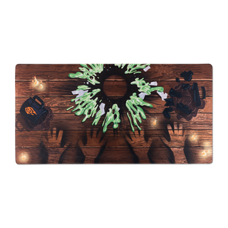 GMM Experiment Desk Mat. Top view of desk mat with green slime design and spilled mug.