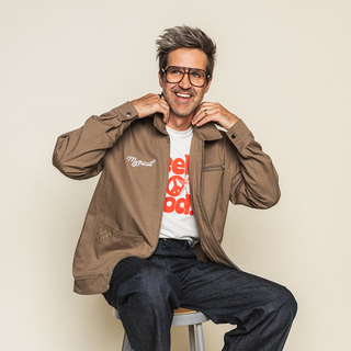 Mythical Work Jacket in cotton duck canvas. "Mythical" script logo, and "Feel Good" design on t-shirt.