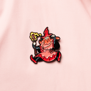 Rhett the Bean Wizard pin of the month. Pin of a red wizard with a staff and a bean.
