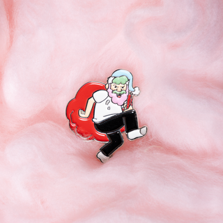 Pin of the Month: Cotton Candy Randy pin! Santa-like character with a blue hat and a red gift bag.