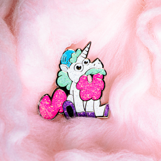 Cotton Candy Randy-corn enamel pin with a white unicorn figure with a blue and green mane and tail.