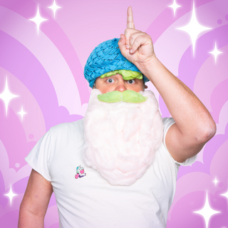 Cotton Candy Randy-corn Glitter Enamel Pin of the Month with a unicorn wearing a white beard and a blue cap.