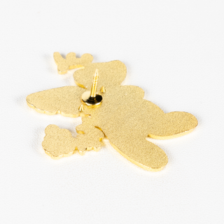 Angled view of floral Randler pin.