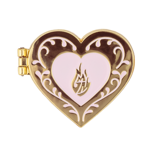 Stink Make Me Horny Locket Pin of the Month. Heart-shaped locket pin with a flame inside of a smaller heart.