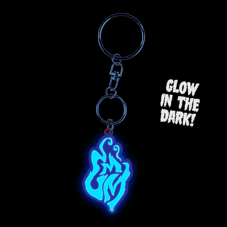 GMM Ghostly glow-in-the-dark keychain with flame design. It says 'GMM'.