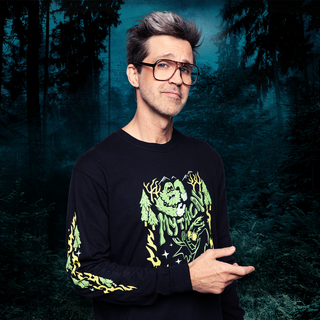 Cryptid Clash Long Sleeve Tee with Bigfoot and Mothman graphic design.