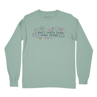 Long sleeve tee with "I don't really know some things" text, flowers, snails, worms, frogs, and other doodle style graphics.