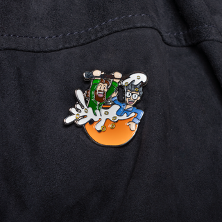 Rhett & Link's Giant Cereal Bowl Bath Pin of the Month featuring Rhett and Link in a cereal bowl.