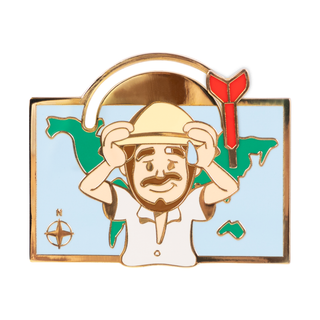 Cartographer Chase Flying Dart Pin of the Month with a cartoon man in a safari hat and a red dart.