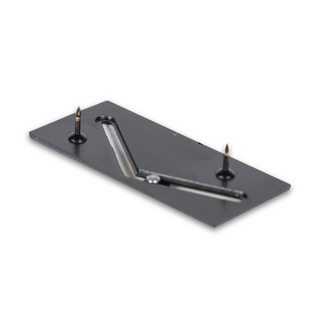 Angled view of a black Sliding Shuffleboard Pin of the Month with two black pins.