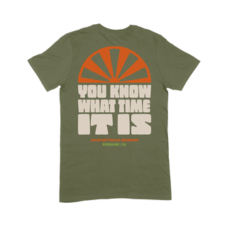 Olive T-shirt with "You Know What Time It Is" text and sunrise graphic on the back.
